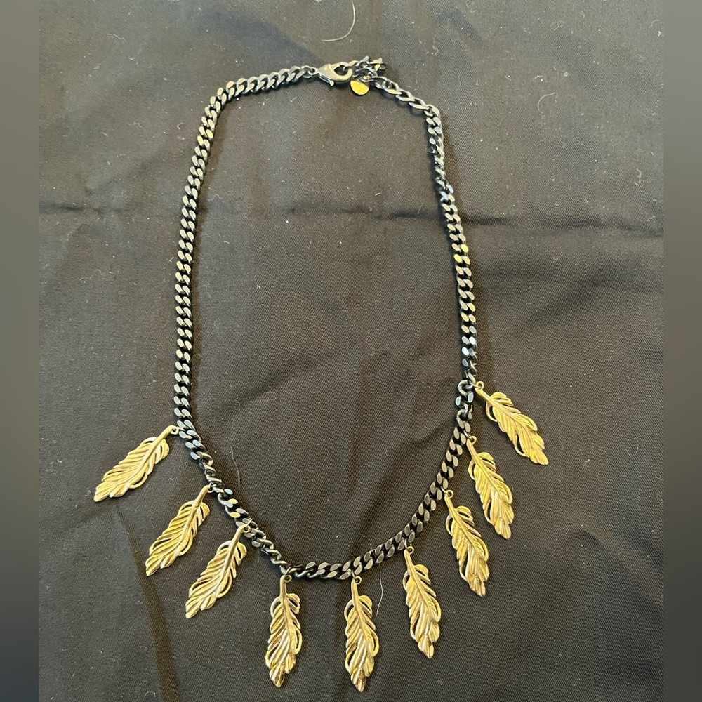 Stella and Dot gold leaf necklace with gunmetal chain item 05-48